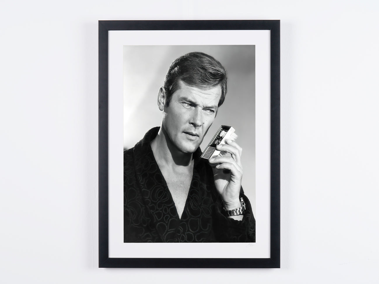 Fine art photograph of Roger Moore in Vivre et laisser mourir, hand-framed — limited edition of 30 numbered prints.