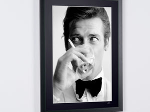 Roger Moore as James Bond 007 in *Shaken, Not Stirred*, 1968