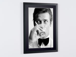 Roger Moore as James Bond 007 in *Shaken, Not Stirred*, 1968