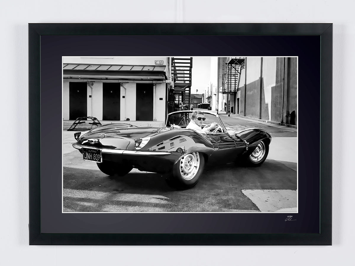 Fine art photograph of Steve McQueen in Steve McQueen — and the 1956 Jaguar XK-SS, hand-framed — limited edition of 30 numbered prints.
