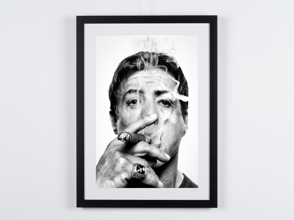 Fine art photograph of Sylvester Stallone in Sylvester Stallone — Portrait with a Cigar, hand-framed — limited edition of 30 numbered prints.