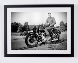 The Great Escape (1963) - Steve McQueen on the Triumph TR6, on-set photo (black and white) — framed cinema photograph
