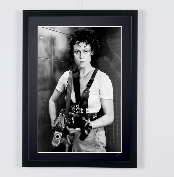 Aliens (1986) — Sigourney Weaver (Ellen Ripley), pulse rifle in hand