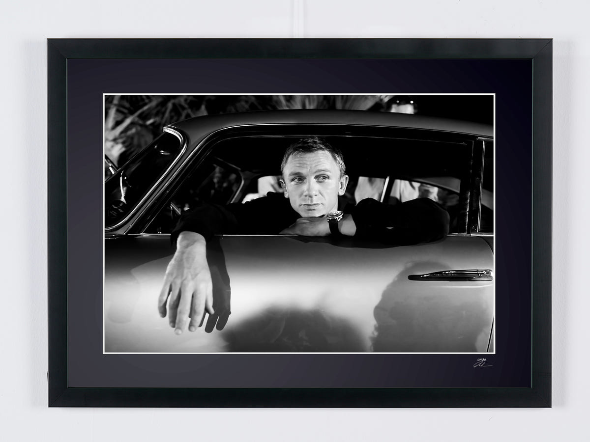 James Bond 007: Casino Royale - Daniel Craig as James Bond 007 on Aston Martin DB5 — framed cinema photograph