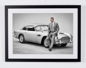James Bond 007: Spectre, Daniel Craig as James Bond 007 with his Aston Martin DB5 — framed cinema photograph
