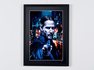 John Wick - Keanu Reeves, gun drawn under the neon lights — framed cinema photograph, Fine Art print