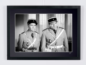 Le Gendarme de Saint-Tropez (1964) - Louis de Funès (Cruchot) and Michel Galabru (Gerber), in full dress uniform (black and white) — framed cinema photograph